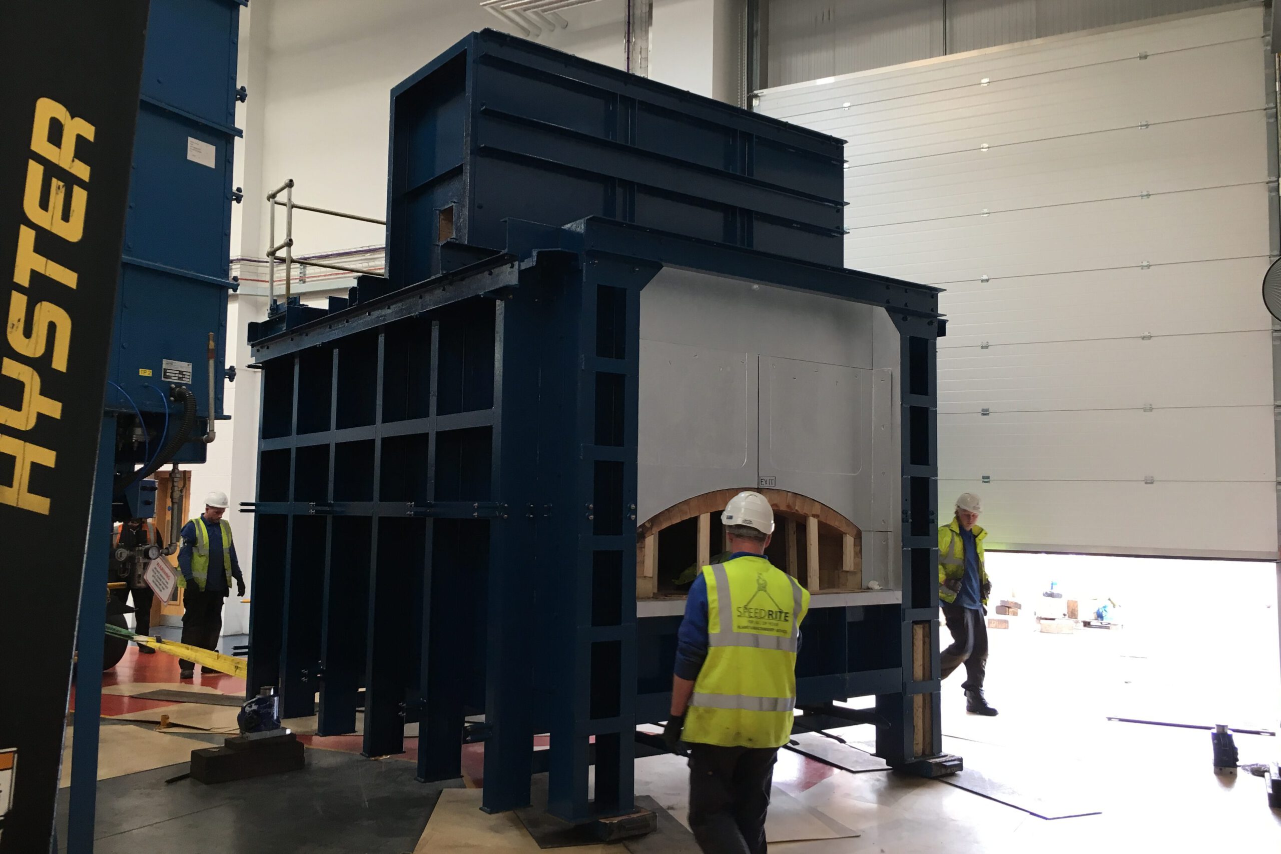 Furnace being rolled out of the factory.